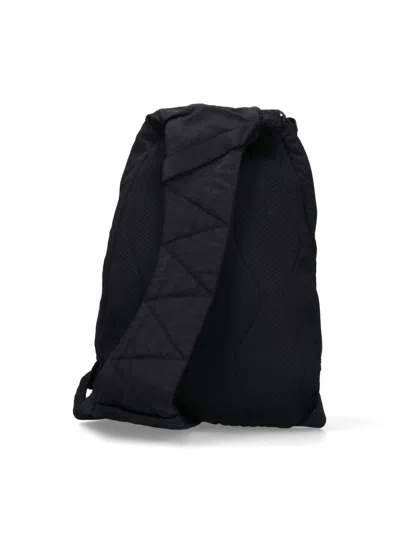 C.p. Company One-shoulder Logo Backpack In Black