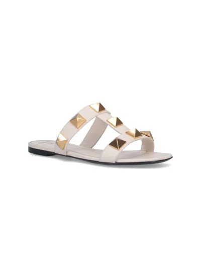 Valentino Garavani Roman Stud Flat Sandals With Signature Pyramid Studs In White