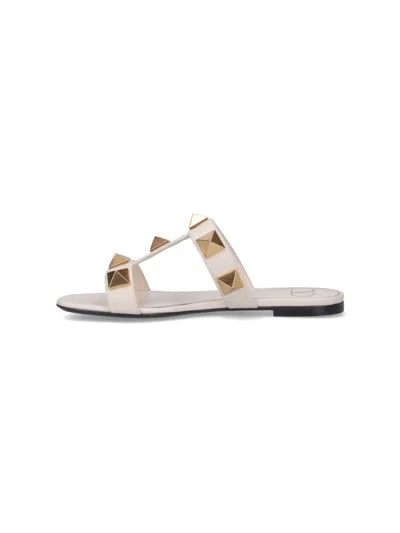 Valentino Garavani Roman Stud Flat Sandals With Signature Pyramid Studs In White