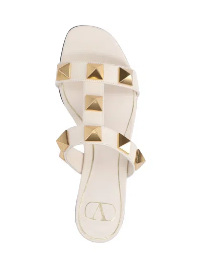 Valentino Garavani Roman Stud Flat Sandals With Signature Pyramid Studs In White