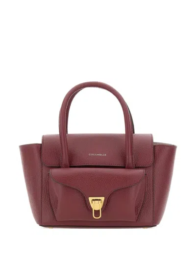 Coccinelle Double Beat Medium Leather Bag In Burgundy