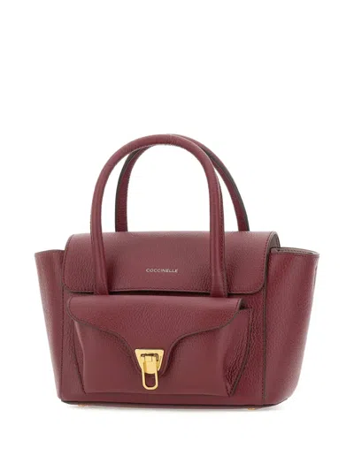 Coccinelle Double Beat Medium Leather Bag In Burgundy
