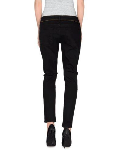 Shop Frame Denim Pants In Black