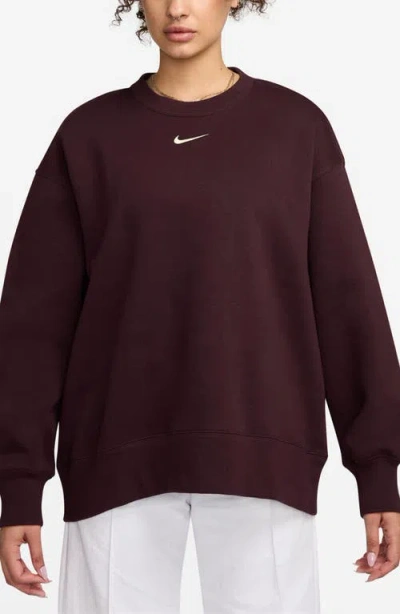 Nike Phoenix Fleece Oversize Crewneck Sweatshirt In Burgundy