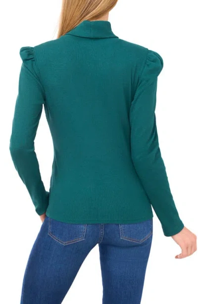 Cece Rib Knit Puff Sleeve Turtleneck Top In Green