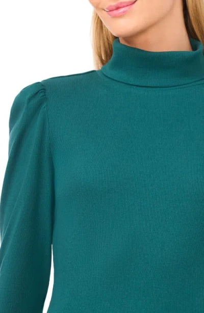 Cece Rib Knit Puff Sleeve Turtleneck Top In Green