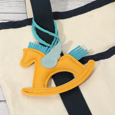 Fashnzfab Faux Leather Winged Rocking Horse Bag Charm In Yellow