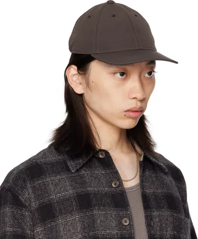 Our Legacy Curved Brim Panelled Design Cap In Brown