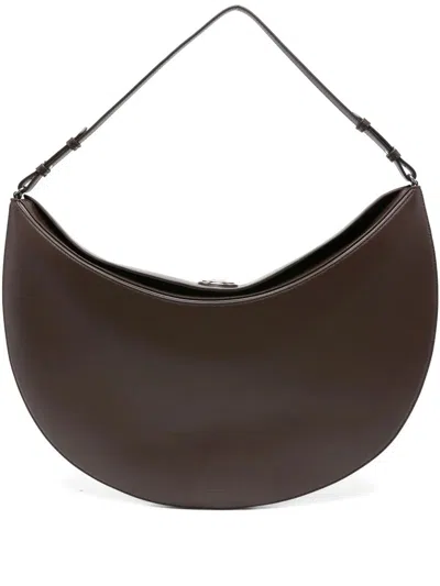 Jacquemus Le Calisso Rond Large Brown Shoulder Bag With Adjustable Strap And Embossed Logo In Leather Woman In Brown