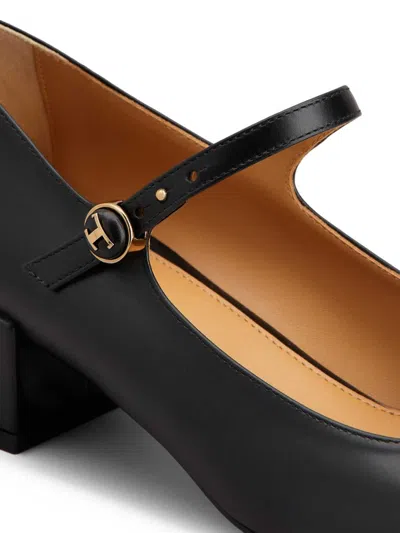 Tod's Almond Toe Block Heel Gold Hardware Pumps In Black