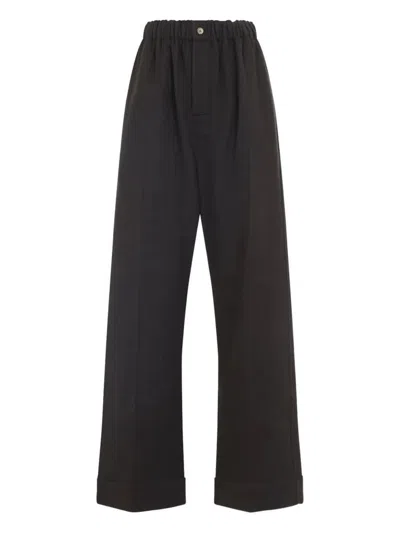Carven Elasticated-waist Cuffed Straight Trousers In Black
