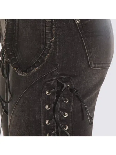 Blumarine Flared Hem Trousers With Lace-up And Frayed Edges In Black