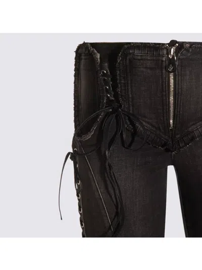 Blumarine Flared Hem Trousers With Lace-up And Frayed Edges In Black