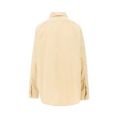 The Row Collared Long Sleeve Button Front Shirt In Nude