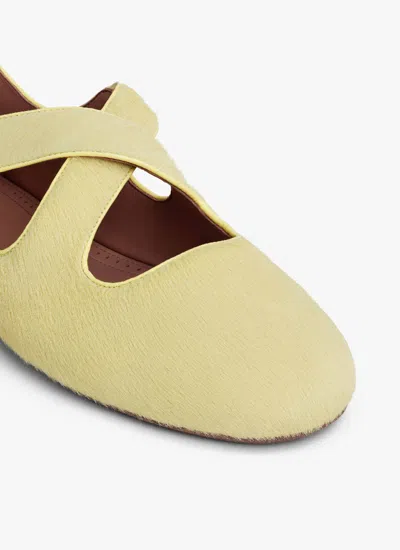 Alaïa Criss Cross Leather-trimmed Calf Hair Ballet Flats In Yellow