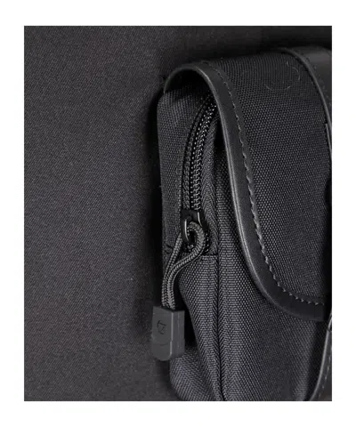 Coperni Structured Mini Skirt With Front Button In Black