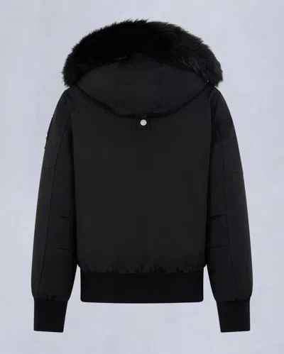 Moose Knuckles Fitted Hooded Jacket With Plush Fur Trim And Metallic Accents In Black