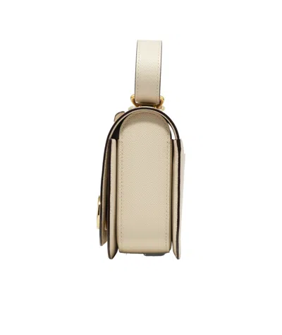 Delvaux Flip Shoulder Bag In Brown