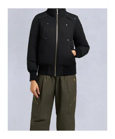 Moose Knuckles Fitted Hooded Jacket With Plush Fur Trim And Metallic Accents In Black