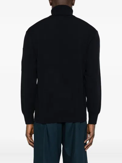 C.p. Company Ivory White Lambswool Turtleneck With Zip Pocket And Signature Motif In Blue