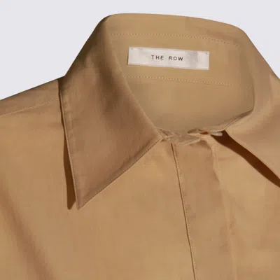 The Row Collared Long Sleeve Button Front Shirt In Sand