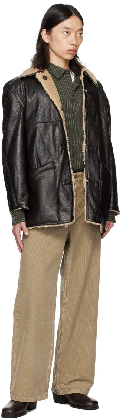 Coor Reversible Fake Shearling Coat In Black