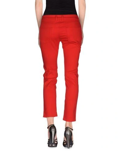 Shop Alexander Mcqueen Denim Pants In Red