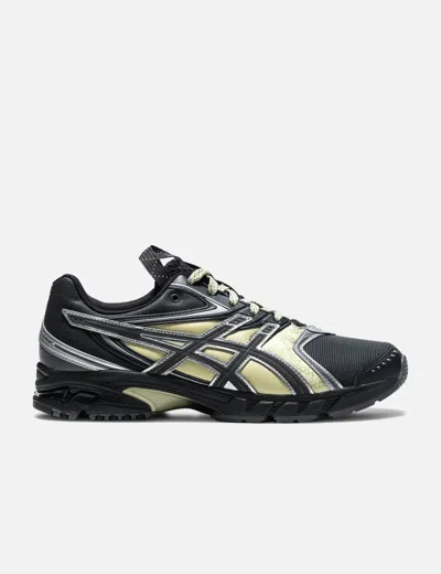 Asics Rounded Toe Sneakers With Grooved Sole And Sleek Finish In Black