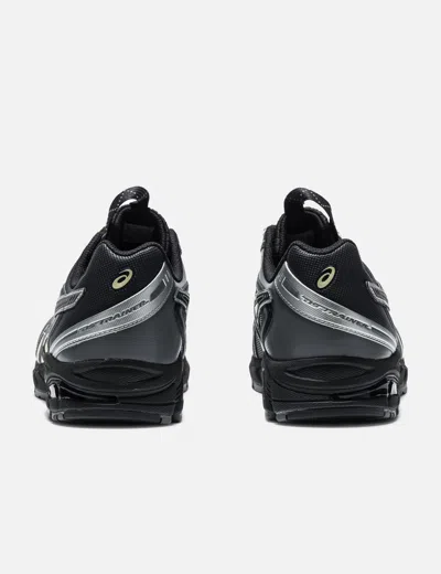 Asics Rounded Toe Sneakers With Grooved Sole And Sleek Finish In Black