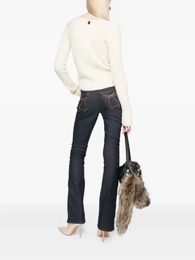 Acne Studios Bow-detail Flared Trousers In Blue