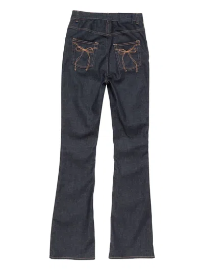 Acne Studios Bow-detail Flared Trousers In Blue