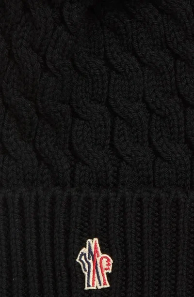 Moncler Wool Hat Featuring Cable Knit And Pom Detail In Black