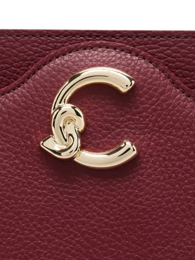 Coccinelle Curved-c Leather Shoulder Bag In Red