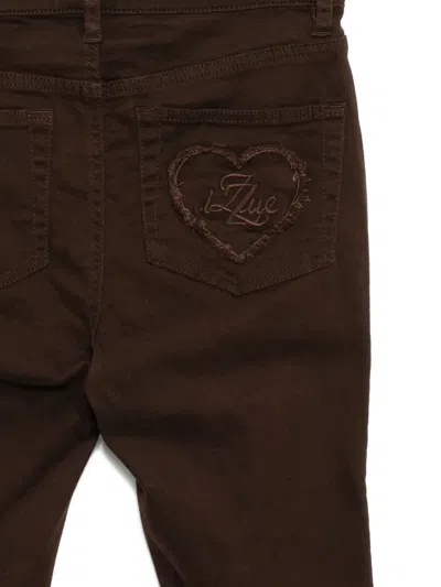 爱心贴花牛仔裤