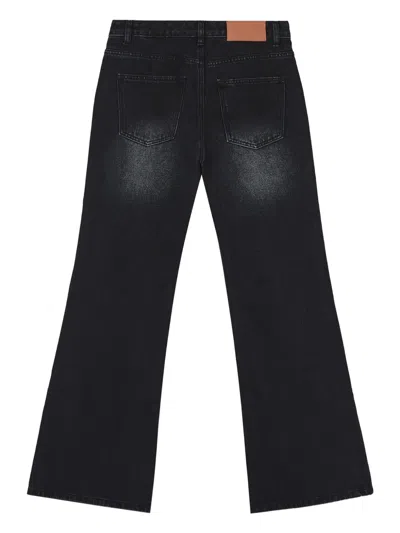 Tout A Coup Logo-patch Jeans In Black