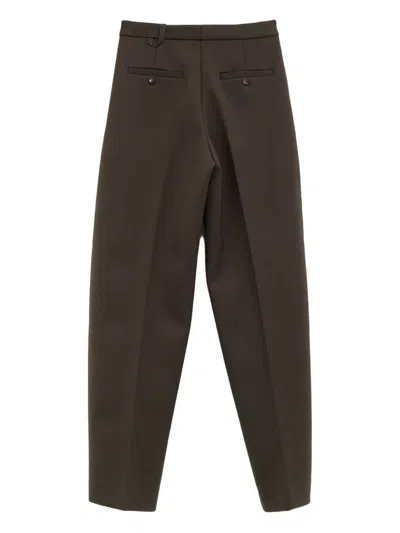Jacquemus Pleated-front Trousers In Brown