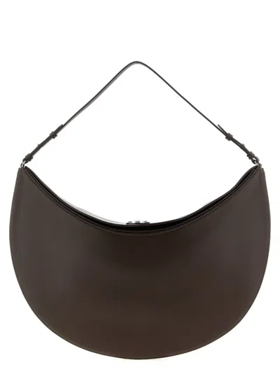 Jacquemus Le Calisso Rond Large Brown Shoulder Bag With Adjustable Strap And Embossed Logo In Leathe In Brown