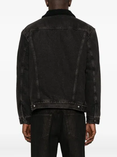 Levi's Relaxed Fit Faux Shearling Lined Denim Trucker Jacket In Black