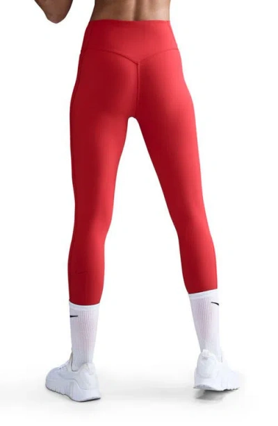 Nike Universa Medium-support High-waisted Pocket 7/8 Leggings In Red