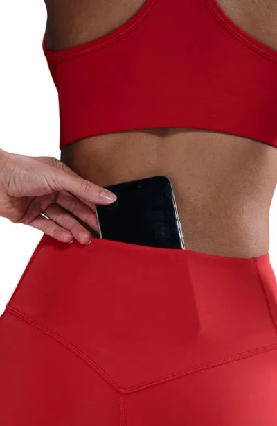 Nike Universa Medium-support High-waisted Pocket 7/8 Leggings In Red