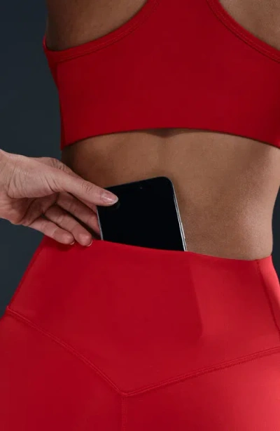 Nike Universa Medium-support High-waisted Pocket 7/8 Leggings In Red