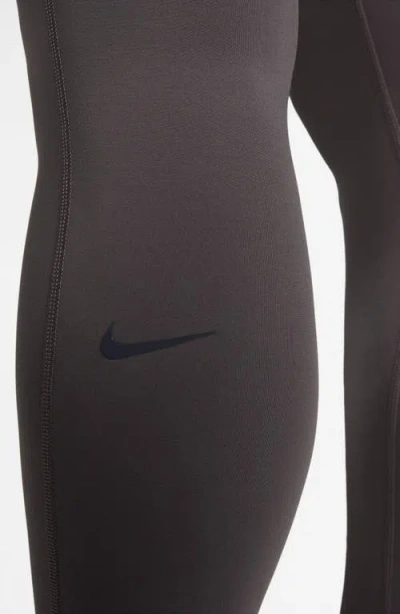 Nike Universa Medium-support High-waisted Pocket 7/8 Leggings In Gray