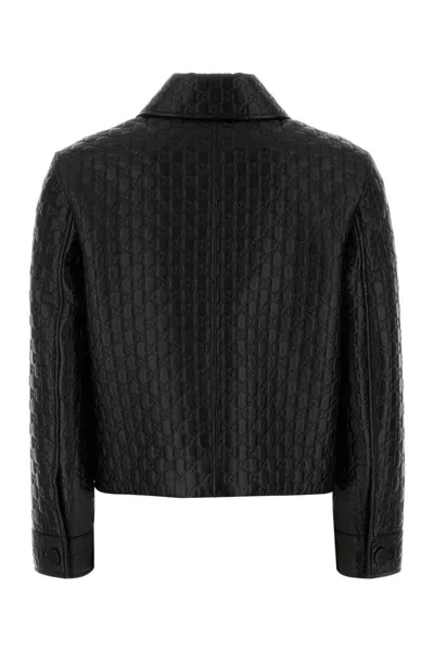 Gucci Embossed Gg Leather Jacket In Black