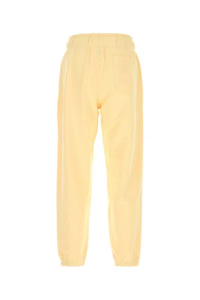 New Balance Cotton Trousers With Elastic Cuffs And Waistband In Yellow