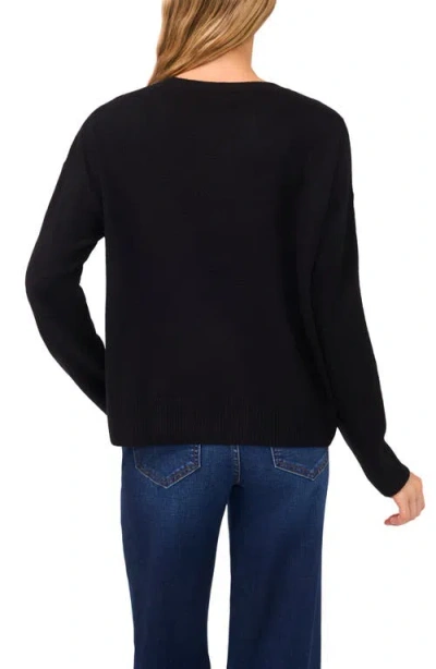 Cece Multicolor Embroidered Flower Sweater In Black