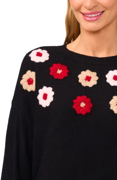 Cece Multicolor Embroidered Flower Sweater In Black