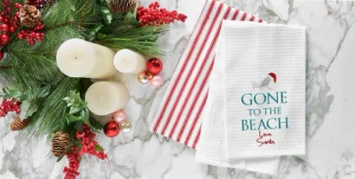 C & F Home C&f Home Gone To The Beach Santa Waffle Weave Cotton Kitchen Towel In White