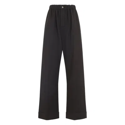 Carven Wide-leg Wool Trousers With Elastic Waistband And Buttoned Details In Animal Print