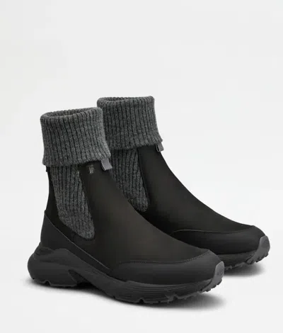 Tod's High Knitted Cuff Sneakers With Textured Upper And Chunky Sole In Animal Print