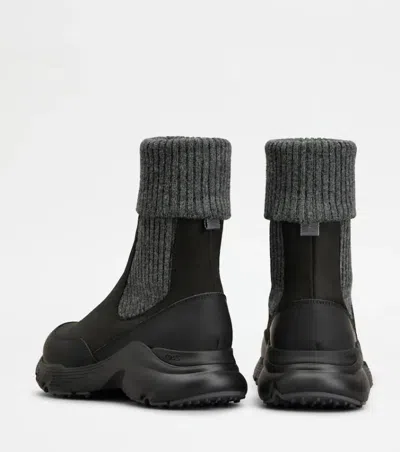 Tod's High Knitted Cuff Sneakers With Textured Upper And Chunky Sole In Animal Print